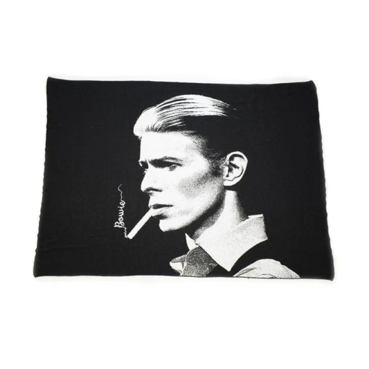 Black blanket with a black and white portrait of David Bowie smoking a cigarette, labeled 'Bowie'.